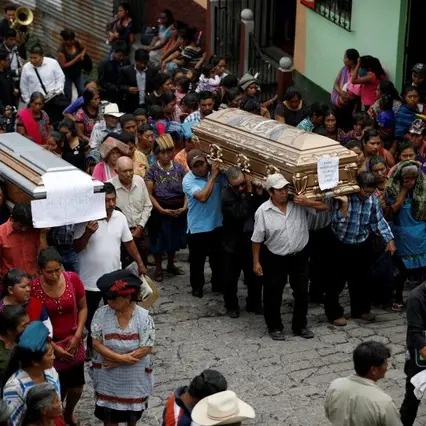 Guatemalans bury dead after volcano eruption