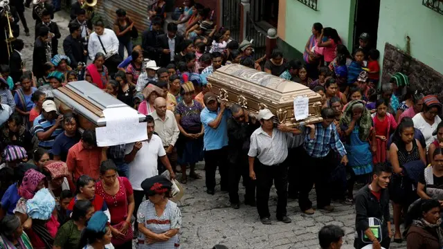 Guatemalans bury dead after volcano eruption