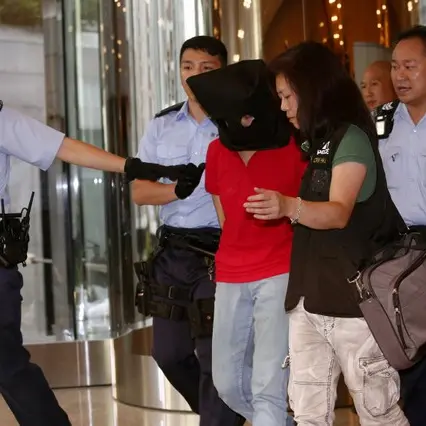 One dead, three wounded in rare Hong Kong shooting