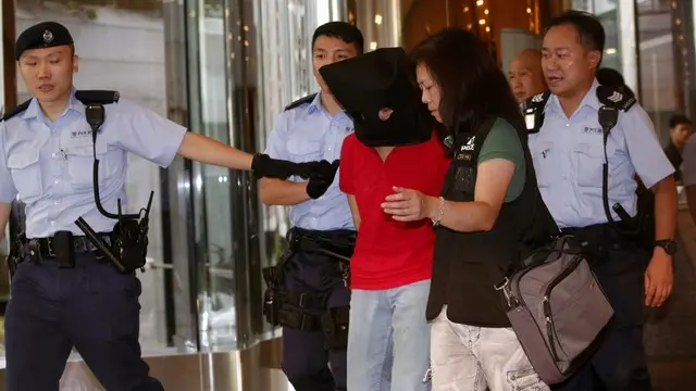 One dead, three wounded in rare Hong Kong shooting