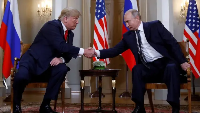 Shock as Trump backs Putin on election meddling