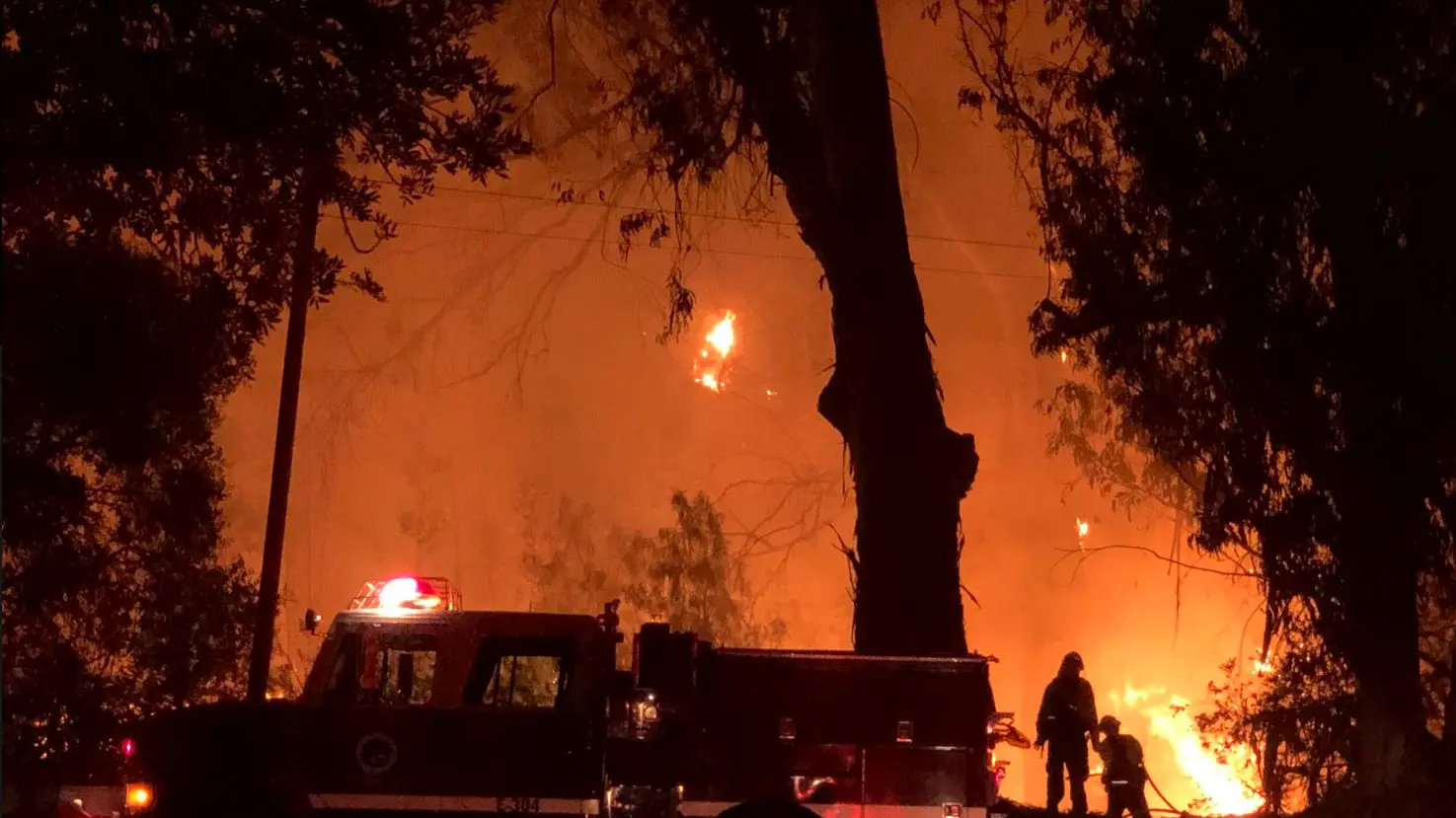 California wildfires claim first life