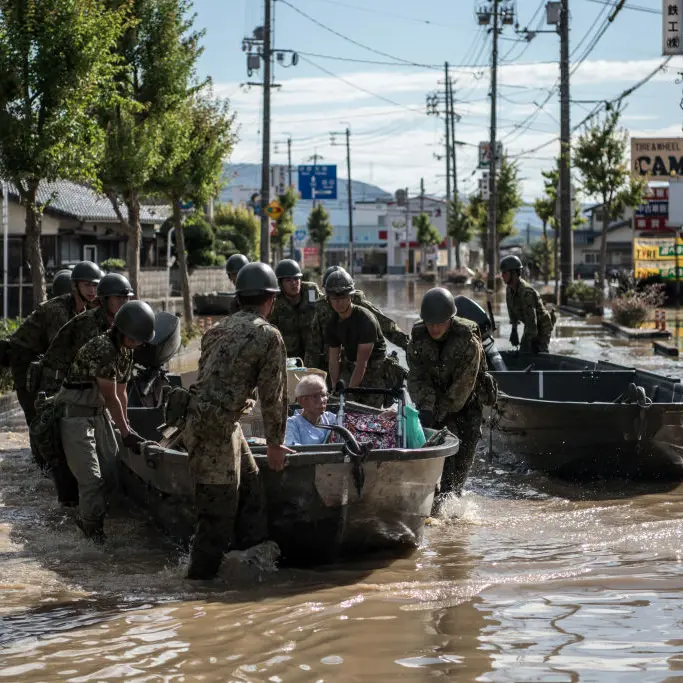 Race to find survivors after Japan floods kill over 100