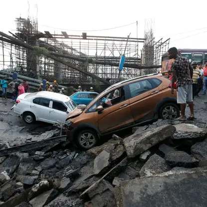 Rescuers search rubble after Kolkata bridge collapse