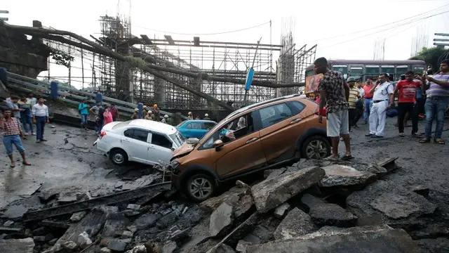 Rescuers search rubble after Kolkata bridge collapse