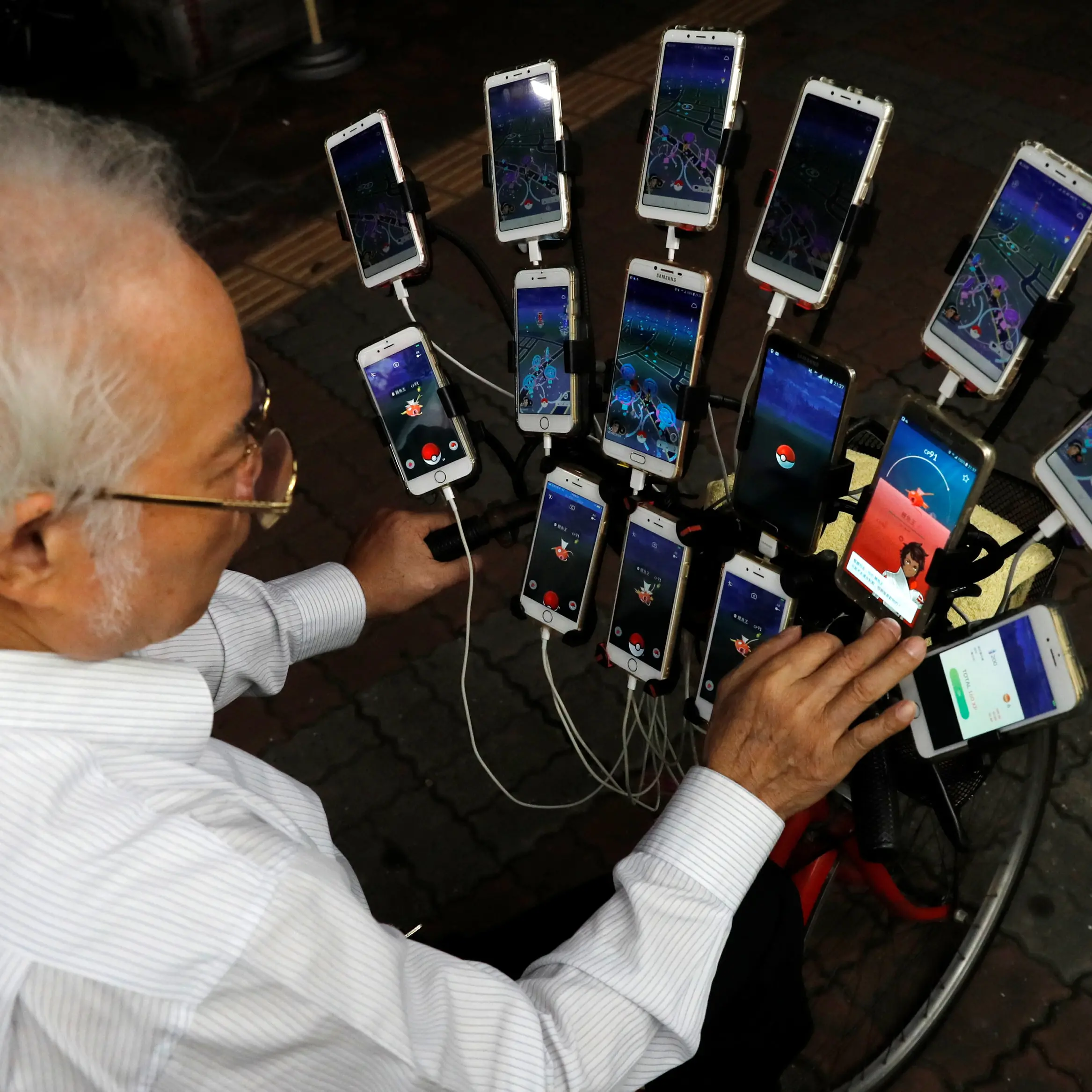 Grandpa catches 'em all, plays Pokemon Go on 15 phones