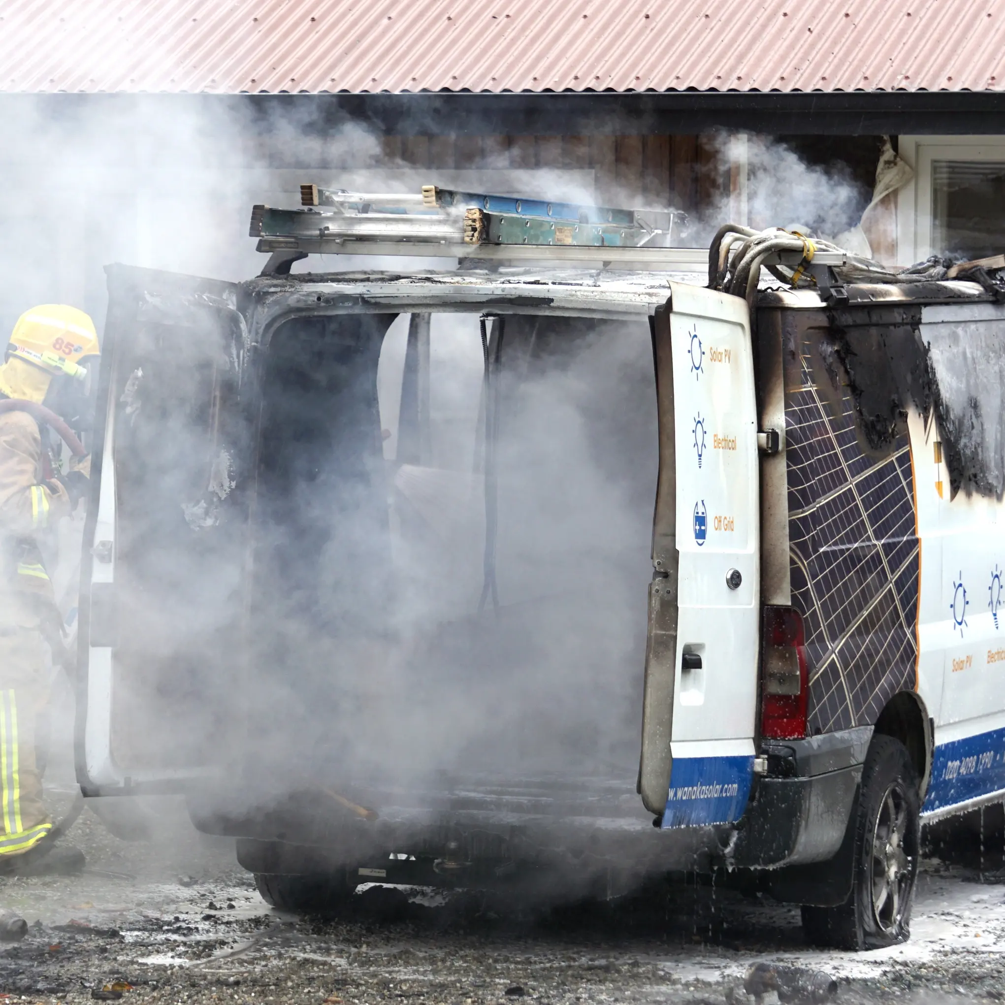 Woman has narrow escape as van catches fire