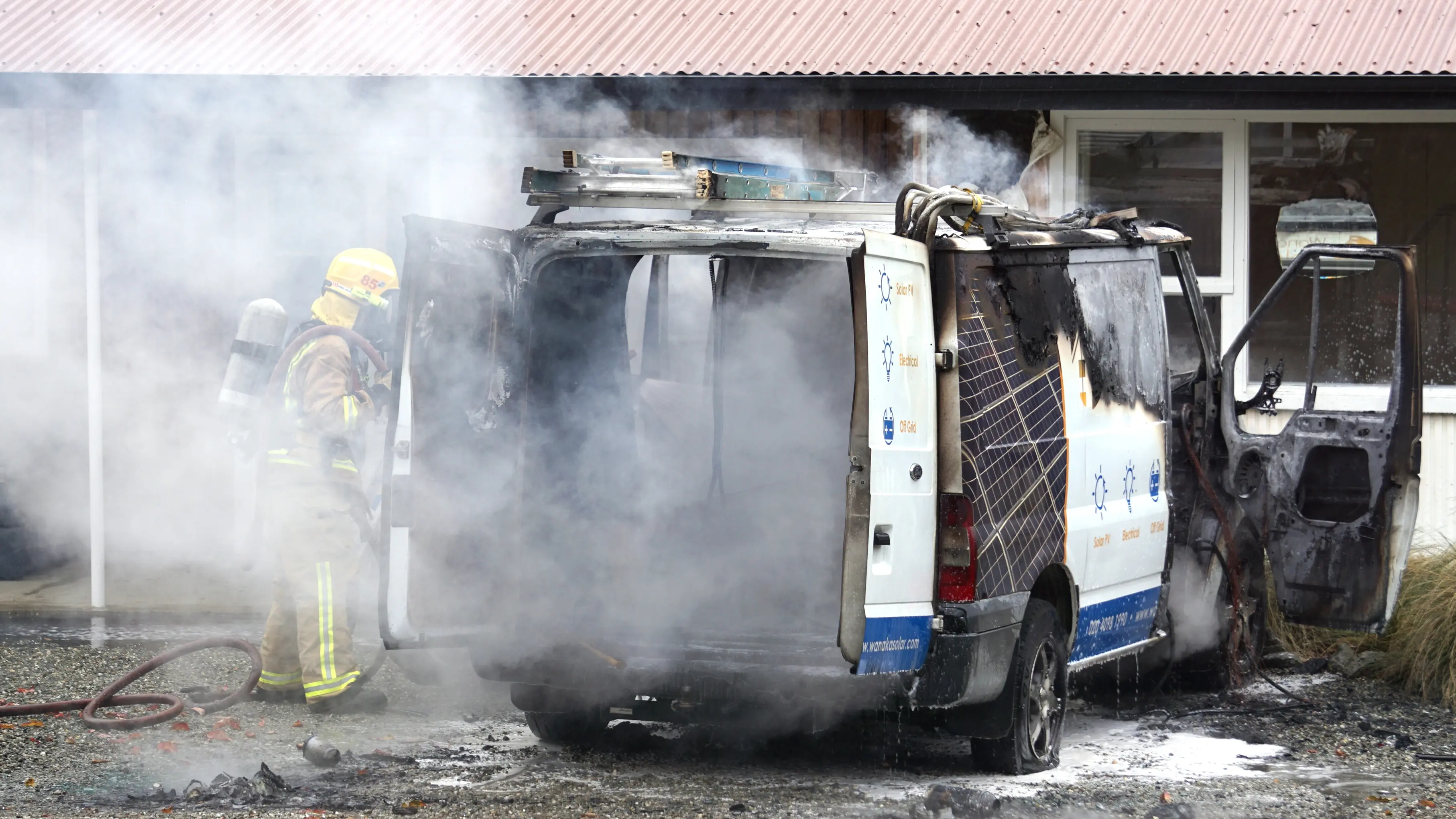 Woman has narrow escape as van catches fire