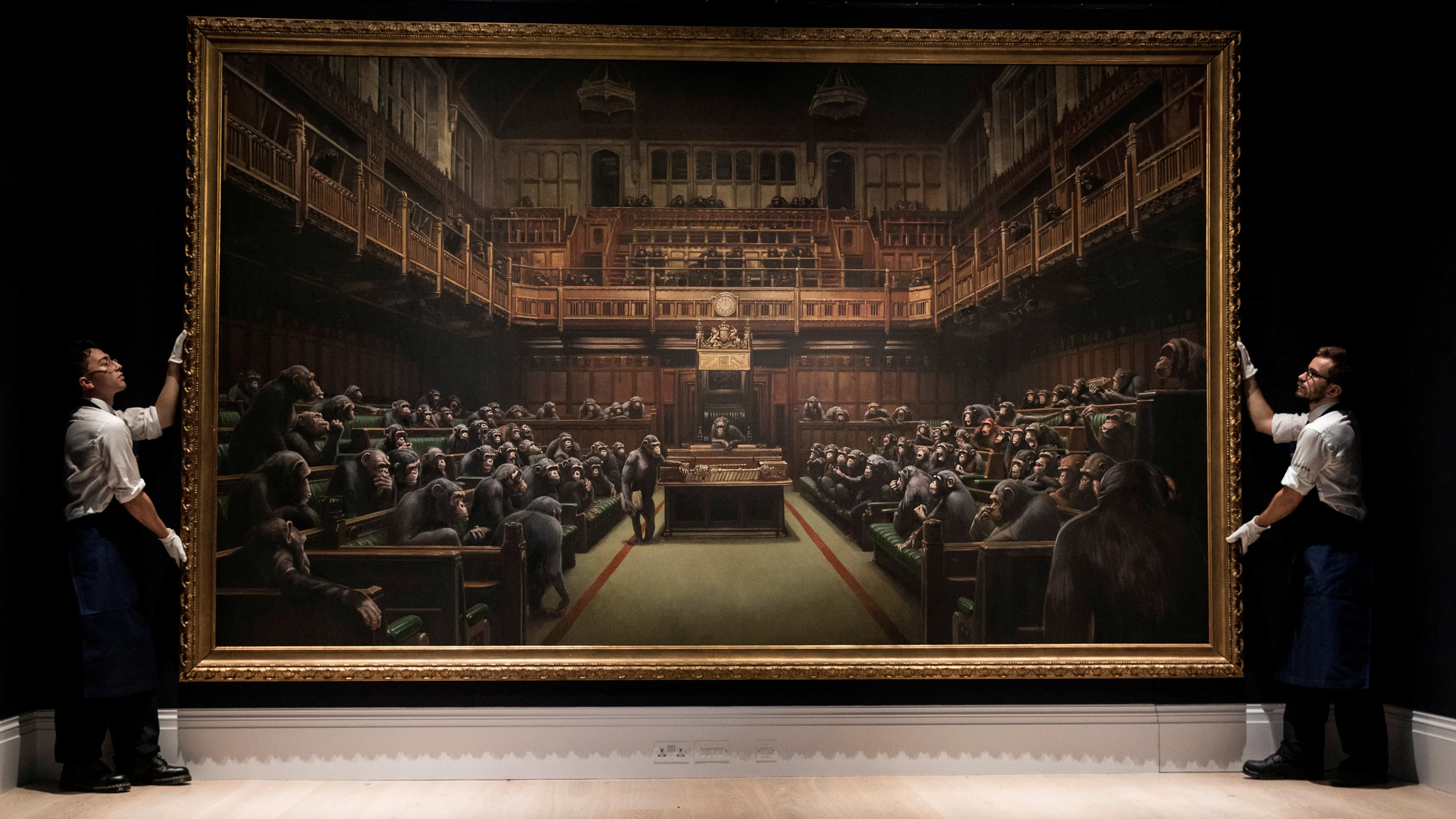Banksy painting 'Devolved Parliament' sells for $19m
