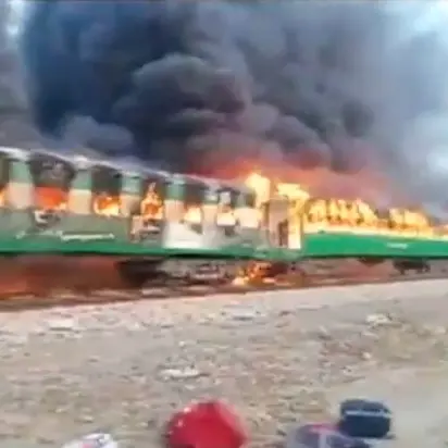 65 dead after fire engulfs Pakistan train