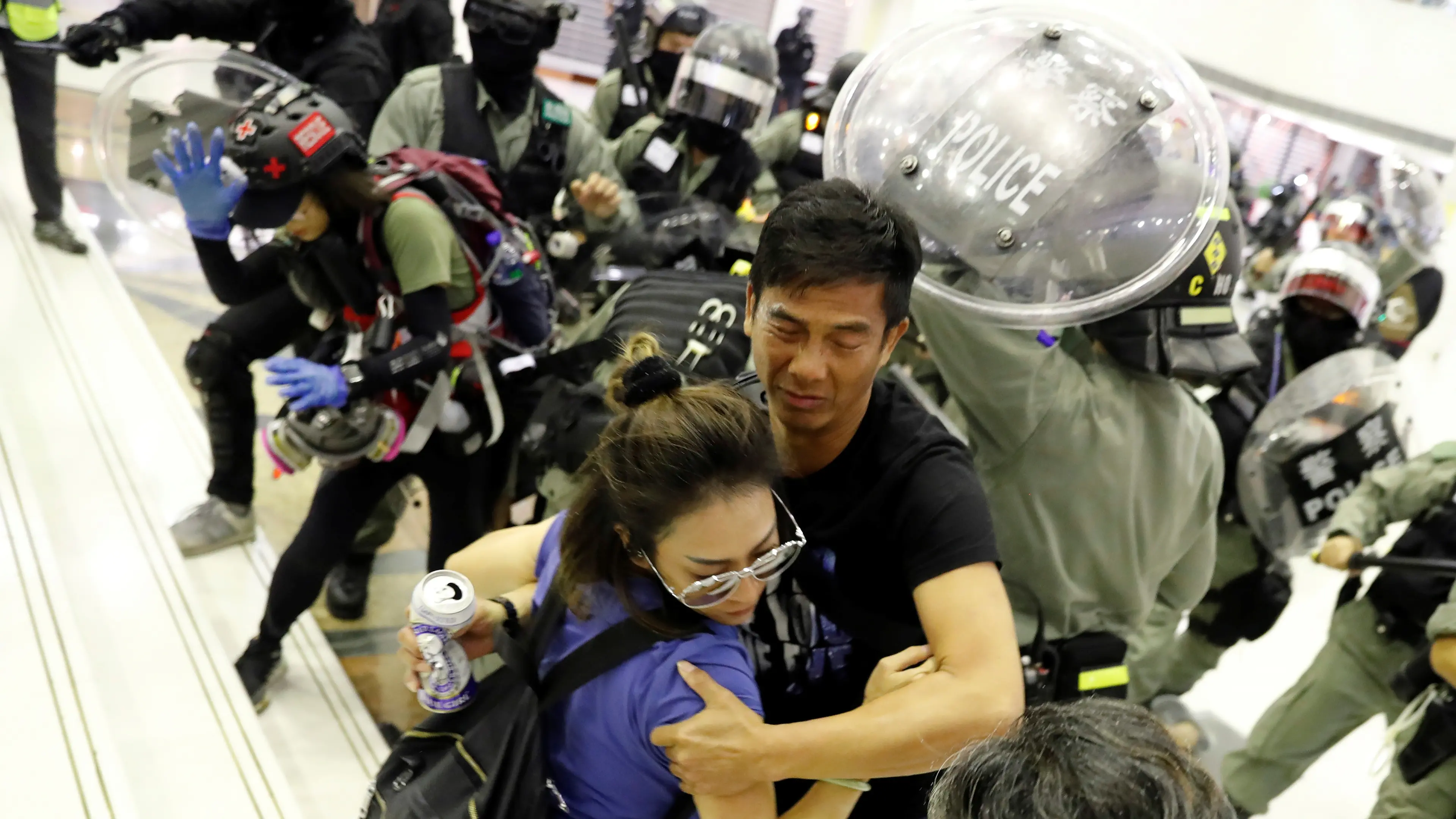 Hong Kong mall clash ends in knife attack, bitten off ear