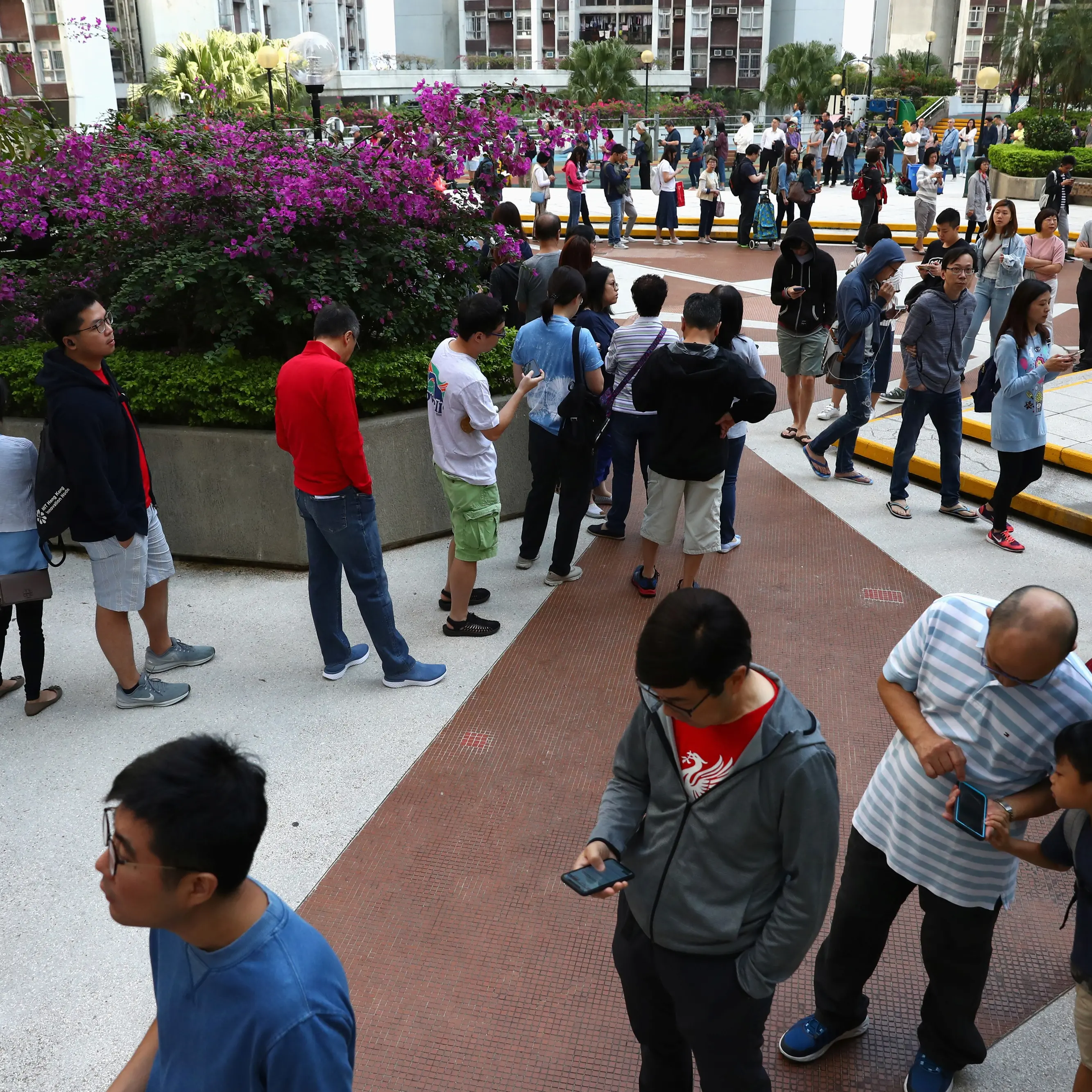 Record numbers vote in Hong Kong amid angry calls for democracy