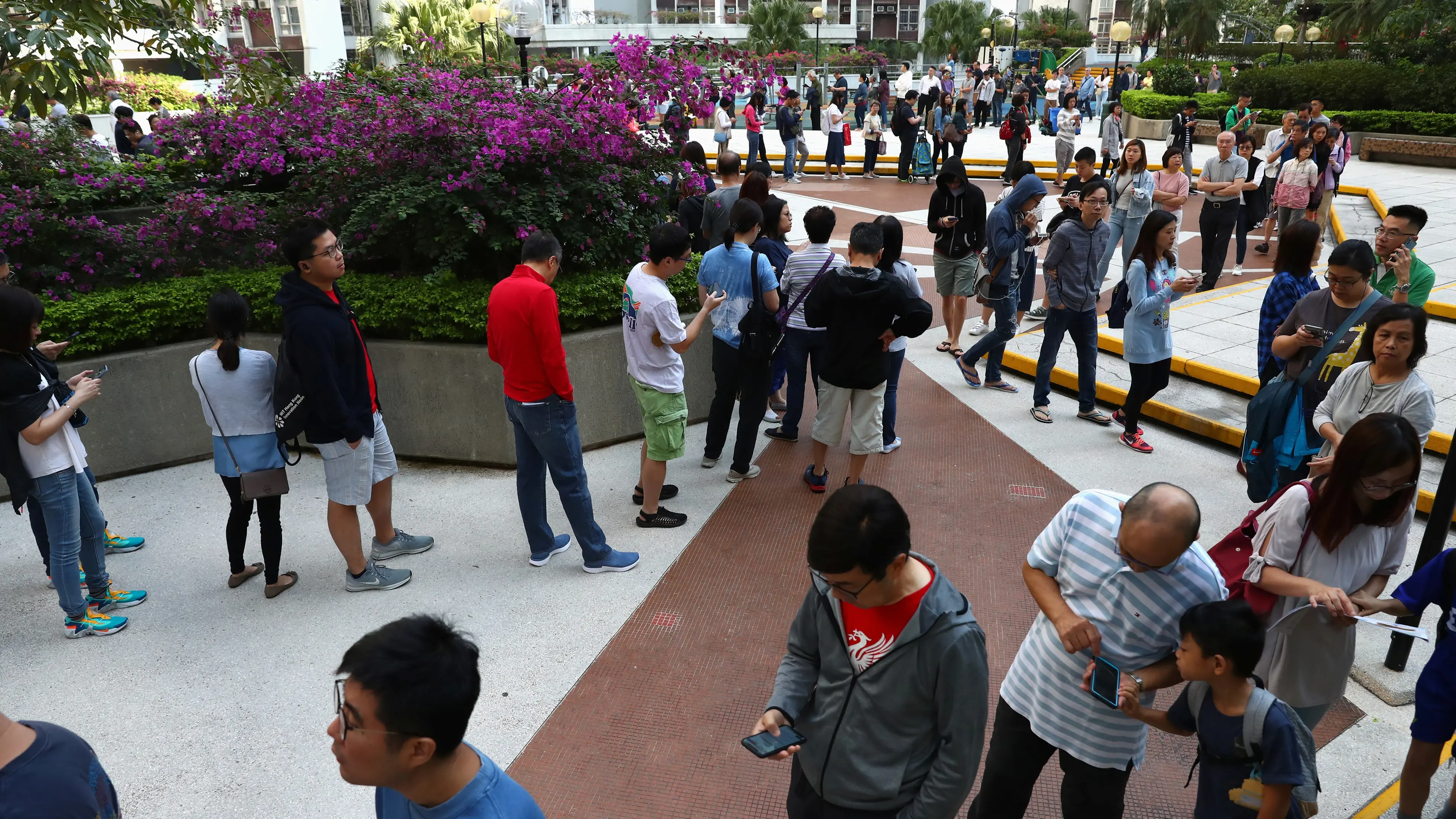 Record numbers vote in Hong Kong amid angry calls for democracy