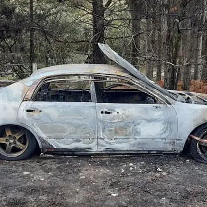 Essential worker's car stolen and burnt out