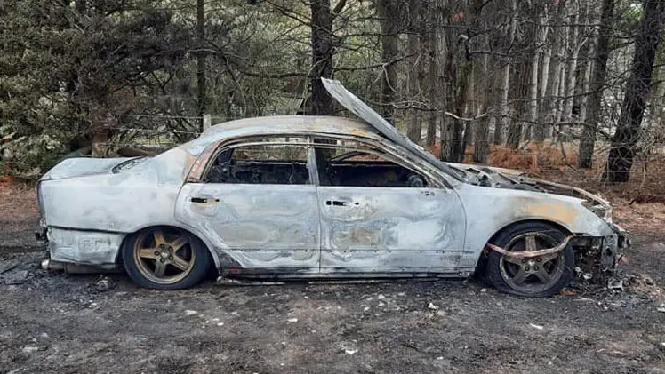 Essential worker's car stolen and burnt out