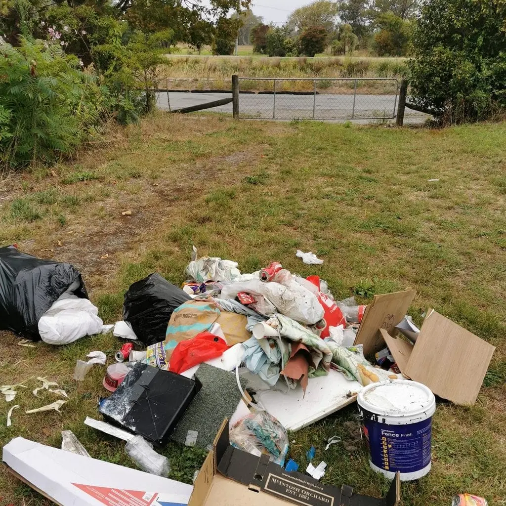 Fly-tippers warned: Residents make signs to stop people dumping rubbish in their Christchurch suburb