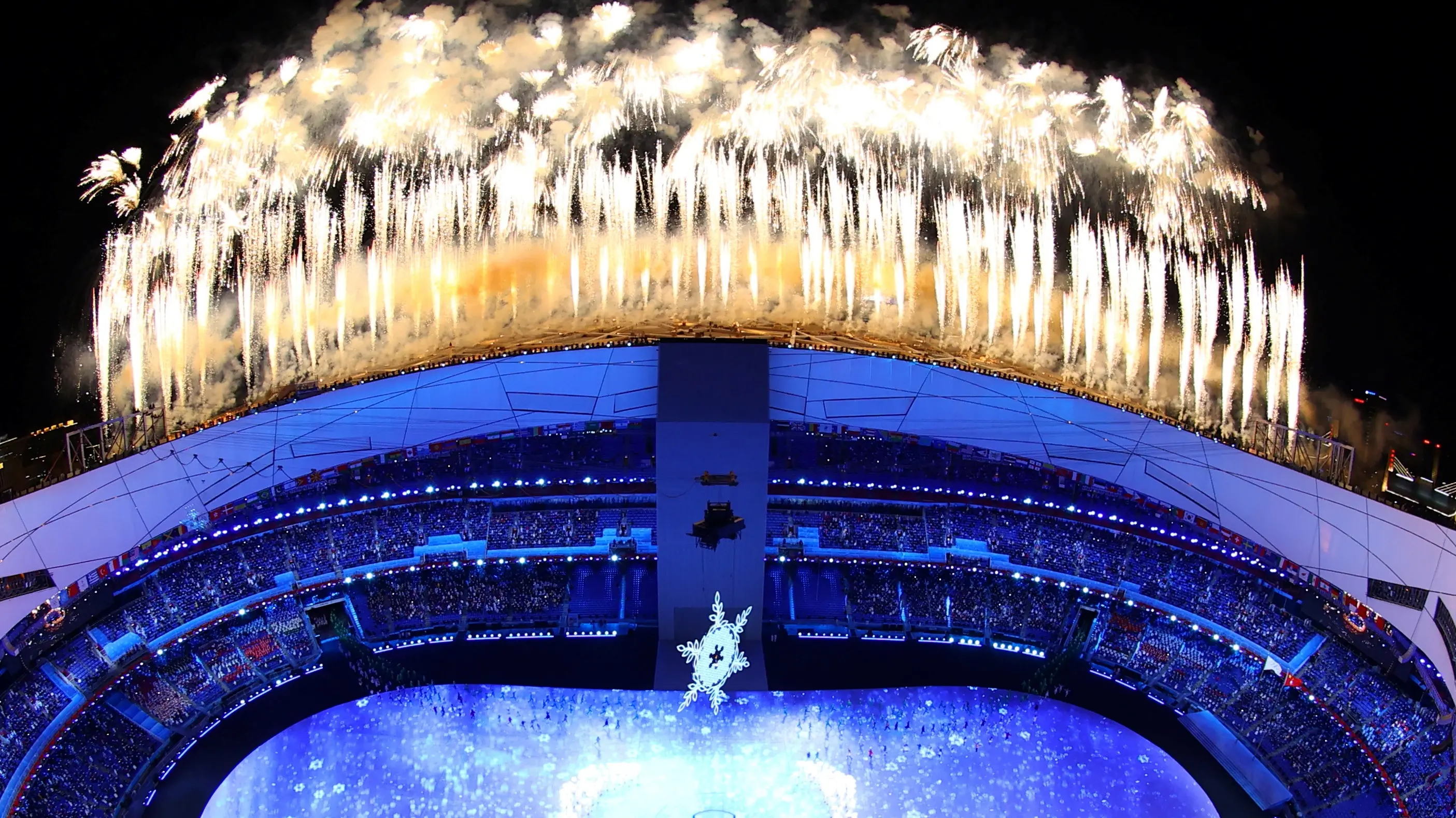 Beijing Games begin under shadow of Covid and conflict