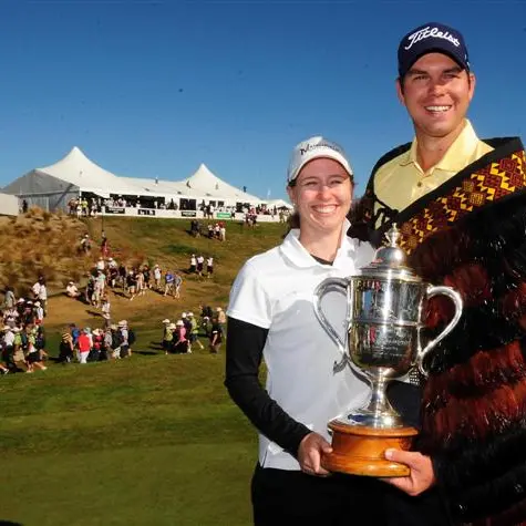 Golf: Gates hangs on to take Open