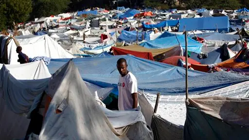 Haiti's homeless get tarps, want tents
