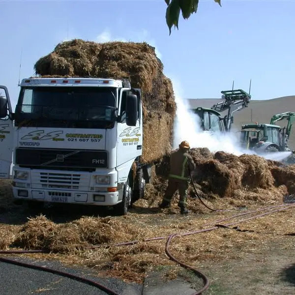 Driver unaware load of straw ablaze