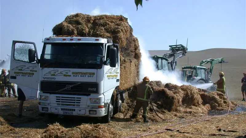 Driver unaware load of straw ablaze