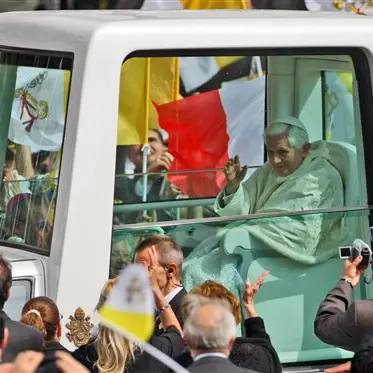 Tearful pope says church will better protect young