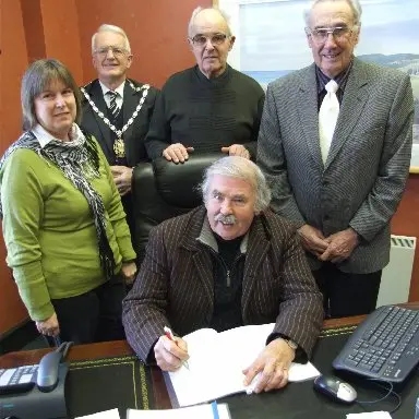 Trust deed signed for helping Haiti
