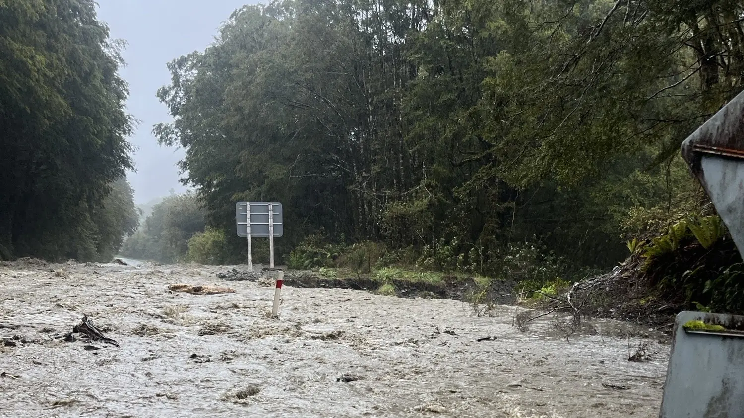 Flooding, slips cut off West Coast