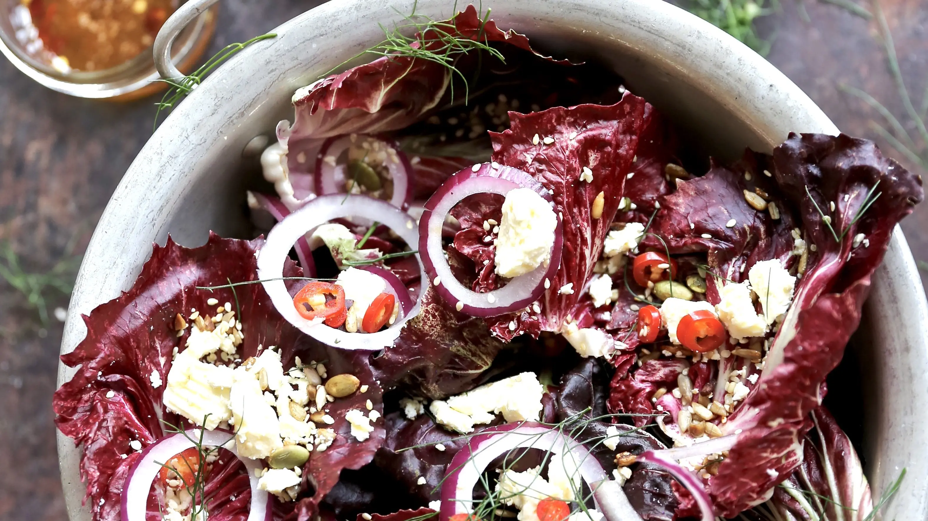 Radicchio salad with feta, toasted seeds and hot honey