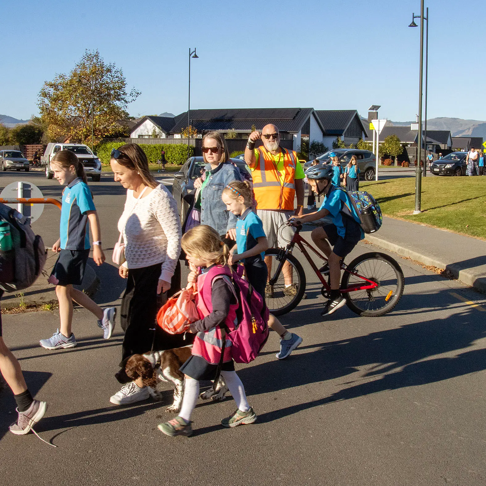 School's caretaker standing between traffic and tragedy