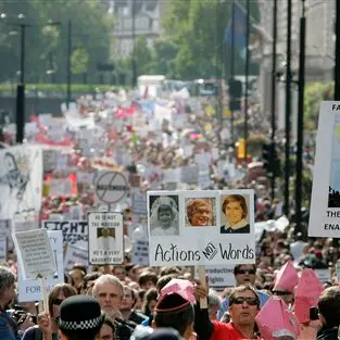 Pope meets abuse victims as thousands protest