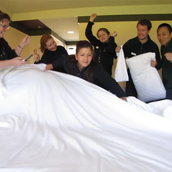 Whirlwind bedmaking team