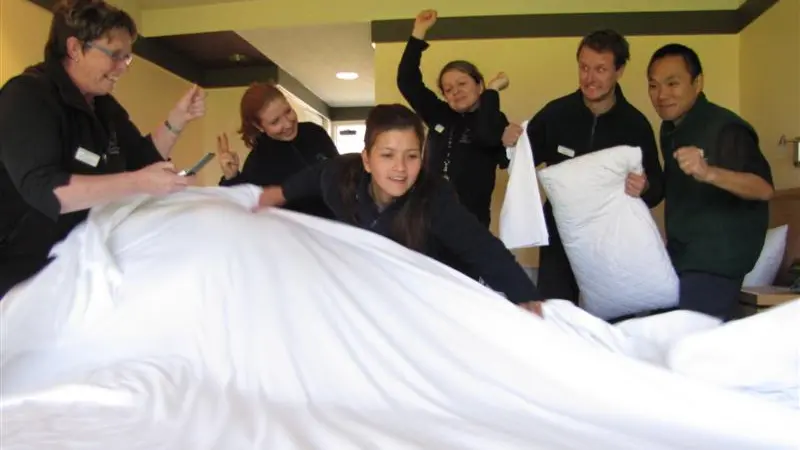 Whirlwind bedmaking team