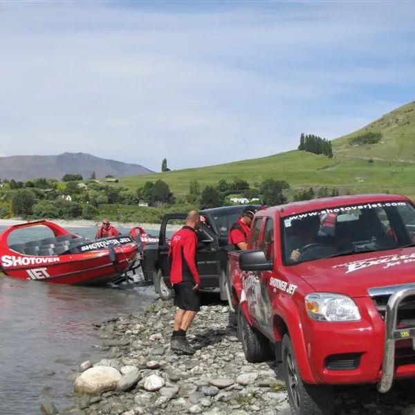 Five hurt as jet-boat hits rock face on river