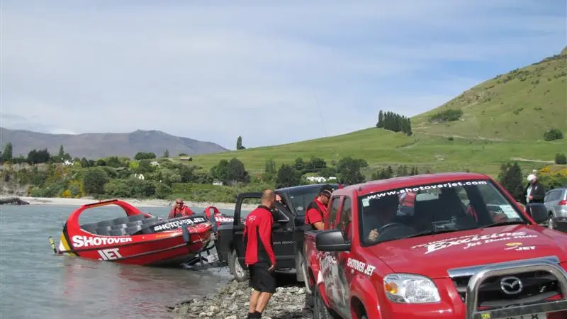 Five hurt as jet-boat hits rock face on river