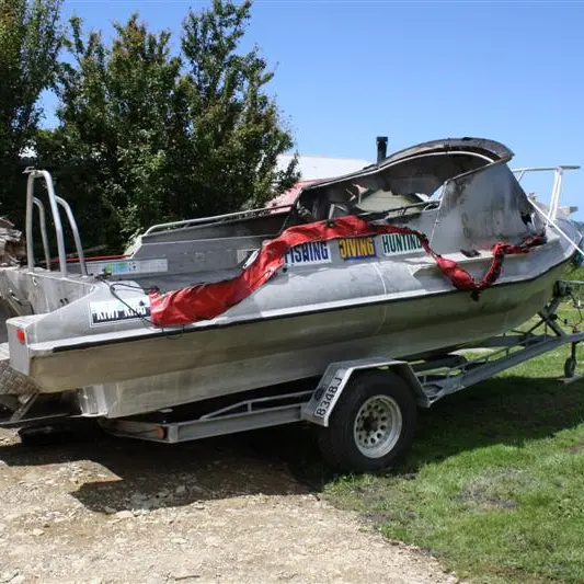 Boat doused, set alight