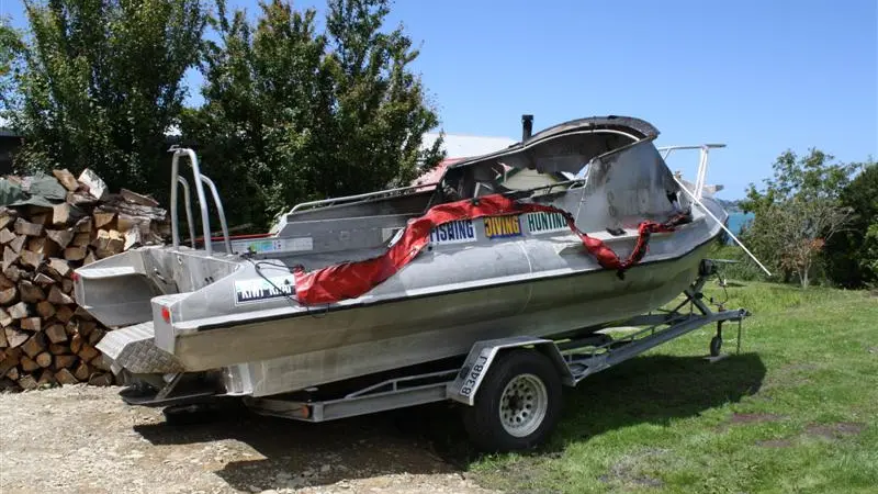Boat doused, set alight