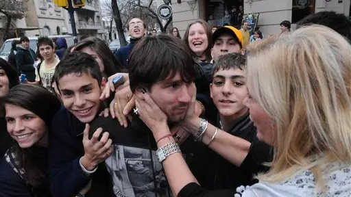 Football: Messi unharmed by youngster's punch