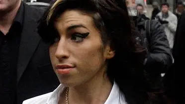 Amy Winehouse checks out of treatment centre