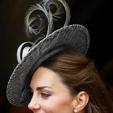 Kate watches blushing William on parade