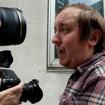 Ex-editor arrested as Murdoch pie-thrower jailed