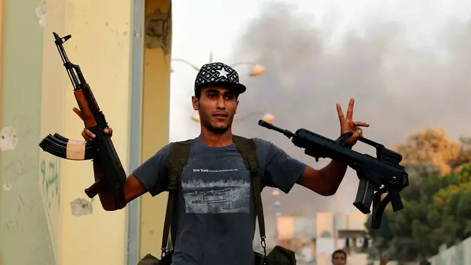 Bounty on Gaddafi's head as fight goes on