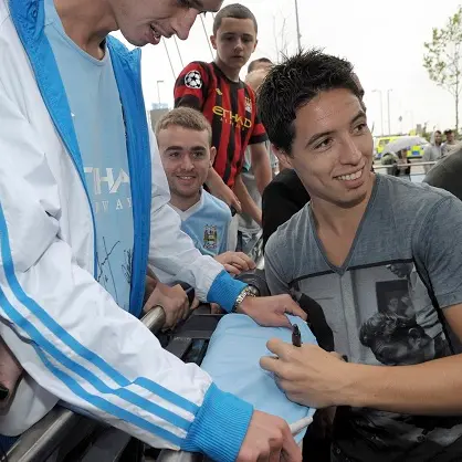 Football: Nasri signs on with Man City