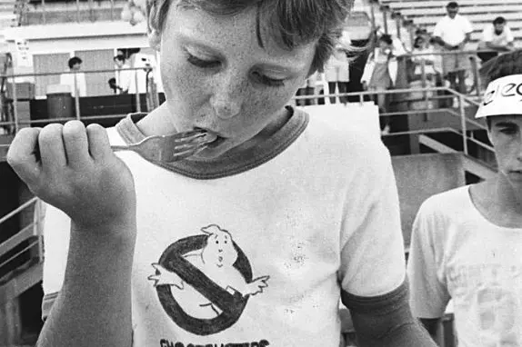 Theo Stewart making his world record attempt for eating 100 jelly-beans with a fork at QEII in 1989. At that time the record was 2min, 24.5s