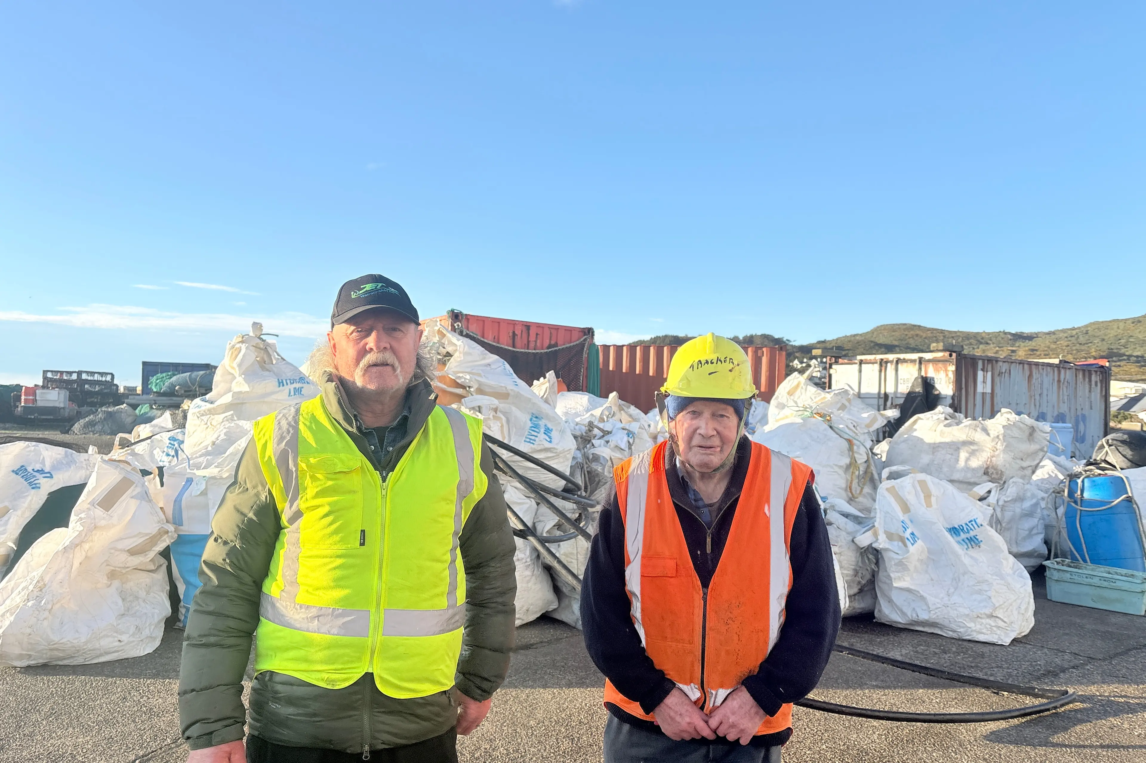 Helping sort the rubbish before it is either recycled or taken to landfill are Johan Groters (left), of Clifden, and Tracker Black, of Bluff.  Photo: Joyce Kolk