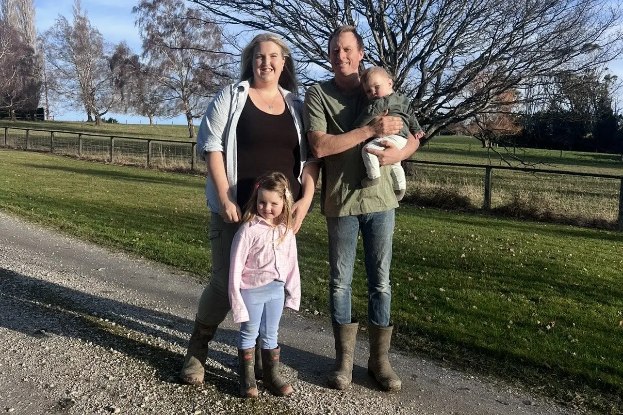 Dairy farmers Scott and Ann Henderson, with daugther Mackenzie, 4, and son Blake, 7 months, have taken the next step in their career after entering an equity partnership on Endowment farm in Pebbly Hill near Hedgehope. Photo: Supplied