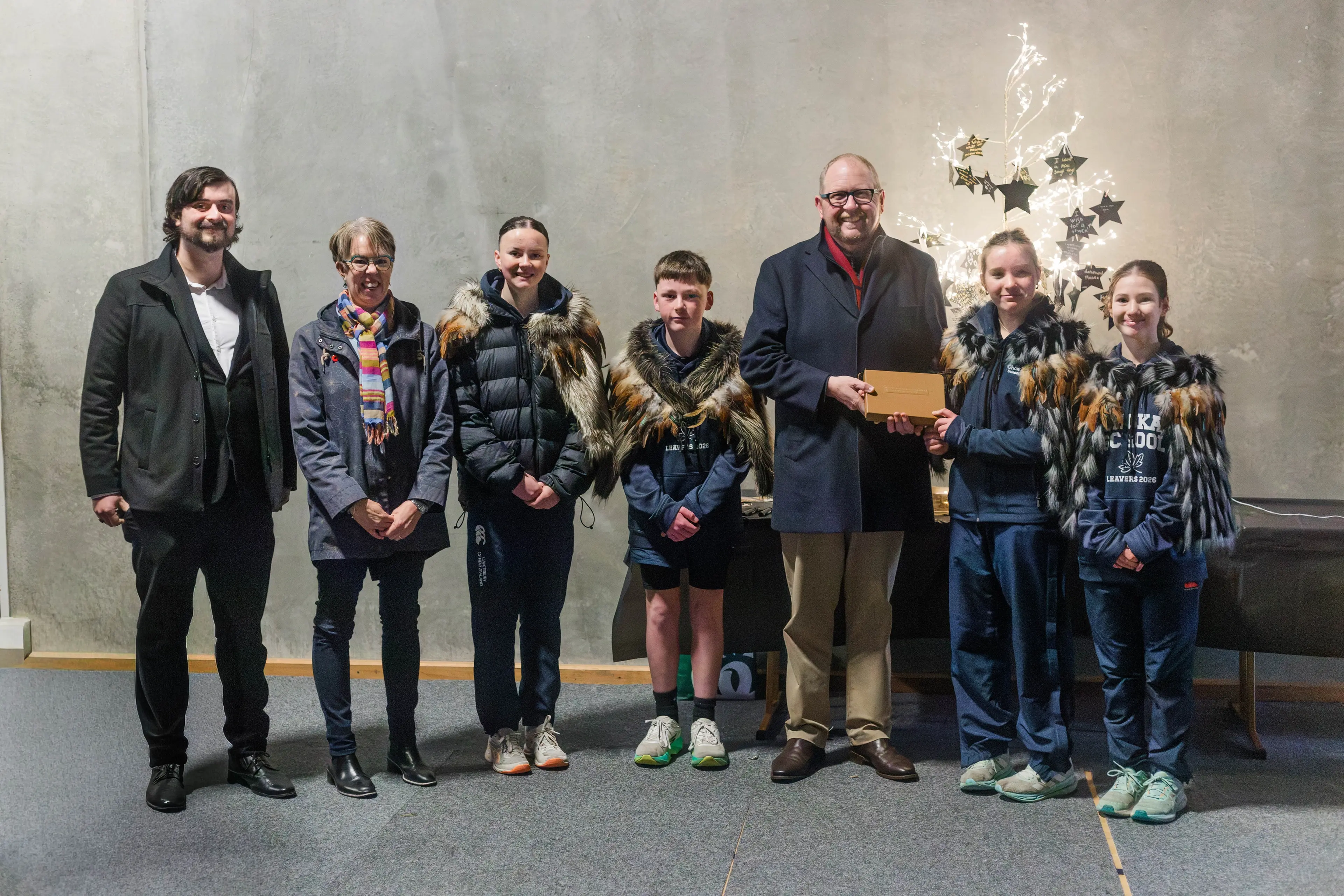 Ohoka history captured . . . Waimakariri District librarians Ciaran Findlay and Sally O\\u2019Connell, and Waimakariri Mayor Dan Gordon receive the book from \\u014Choka School\\u2019s head students (from left) Chloe Clark (Head of Sport), Isaac Allen (Head of Arts), Greta Taylor (Head of Culture) and Amelia Barclay (Head of Environment). Photo: Supplied