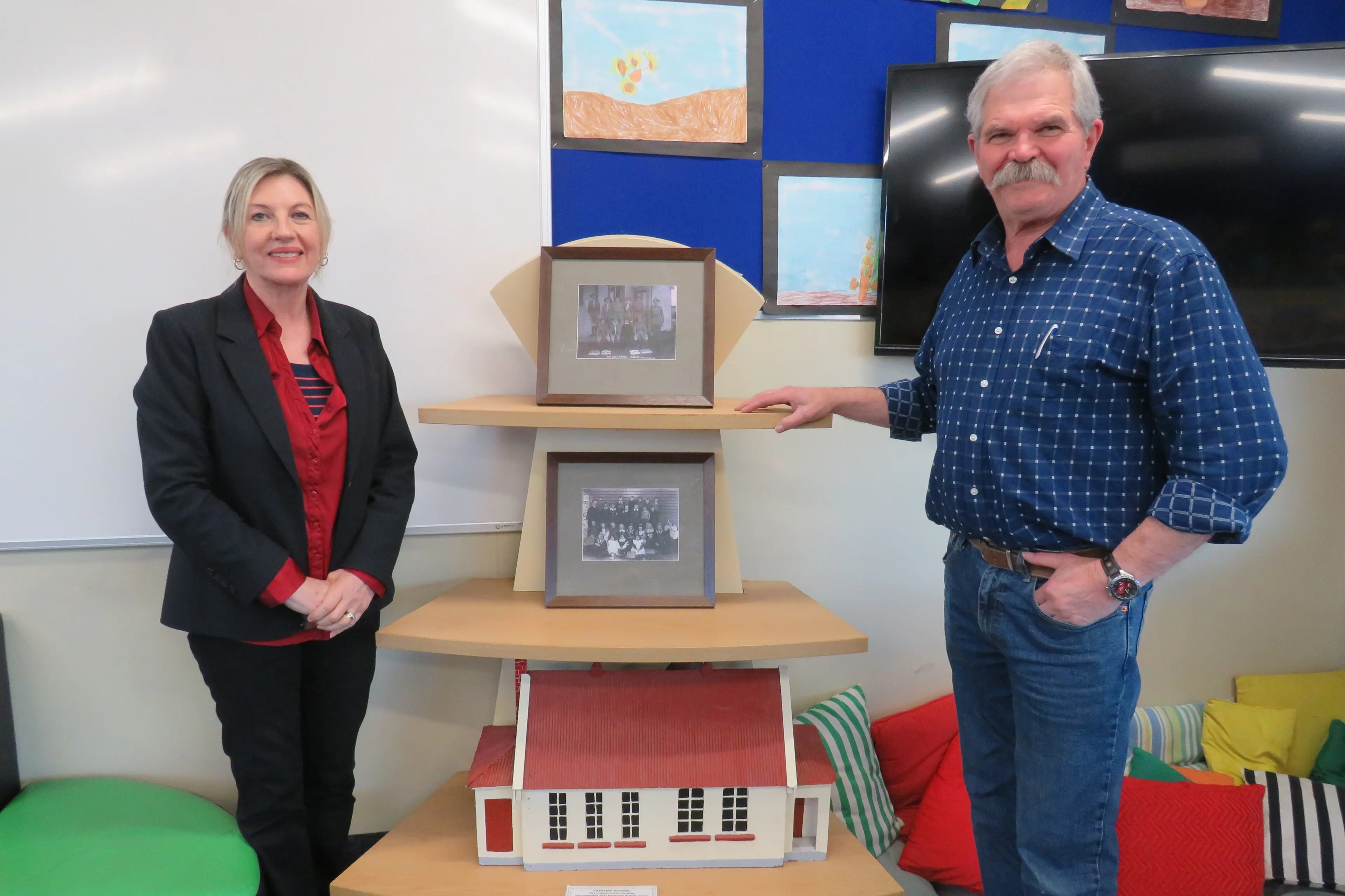 Current principal of Fairton School Jude Irwin, left, with former principal Mike Hill admiring some of the items that will be on display at the schools 125 celebrations in September. Photo: Dellwyn Moylan