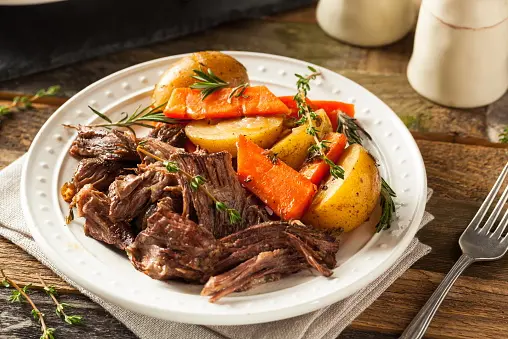 The man was discovered eating a roast dinner behind the wheel. Photo: Getty Images