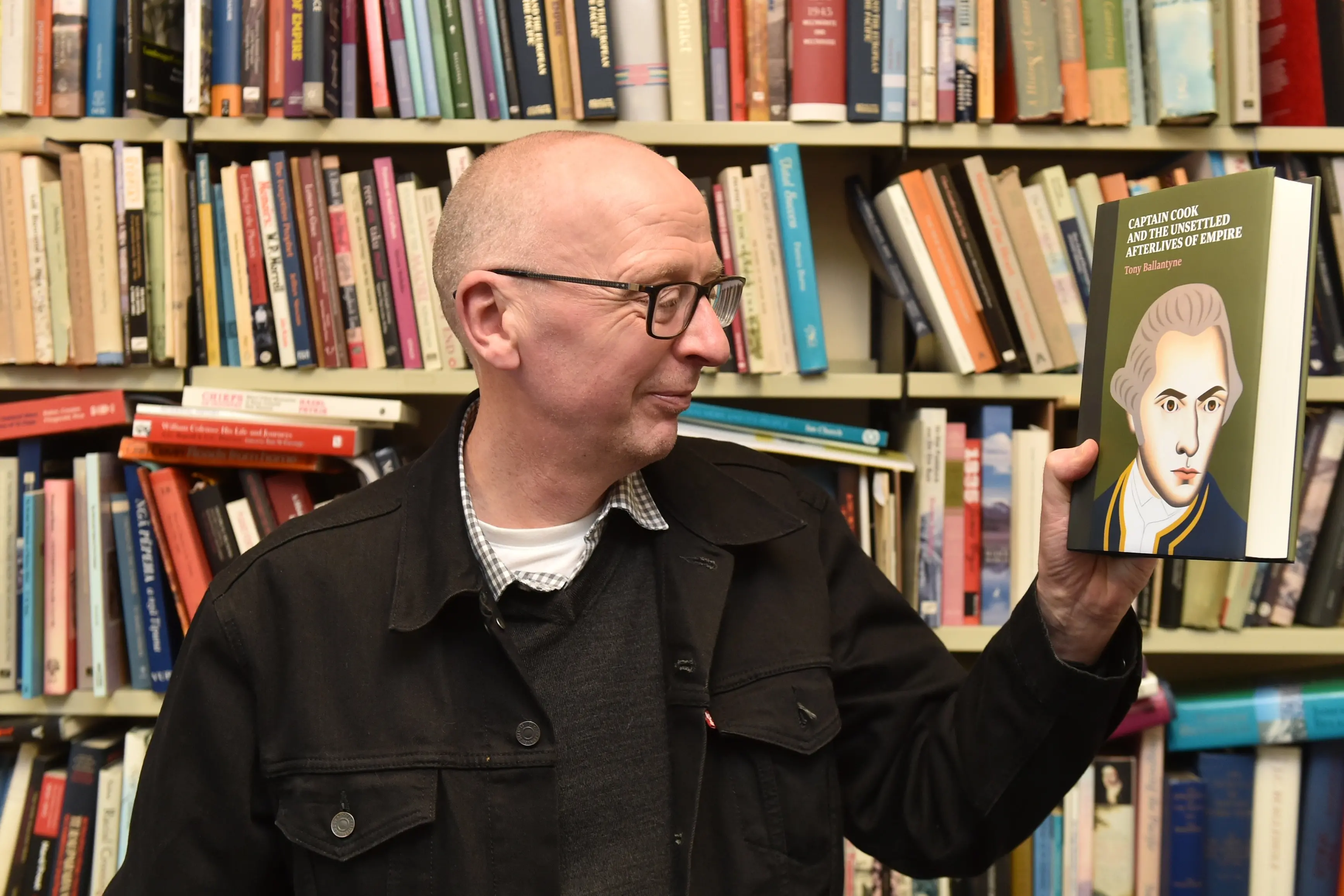 University of Otago distinguished chair in history Prof\\u00A0Tony Ballantyne with his latest book, Captain Cook and the Unsettled Afterlives of Empire. Photo: Gregor Richardson